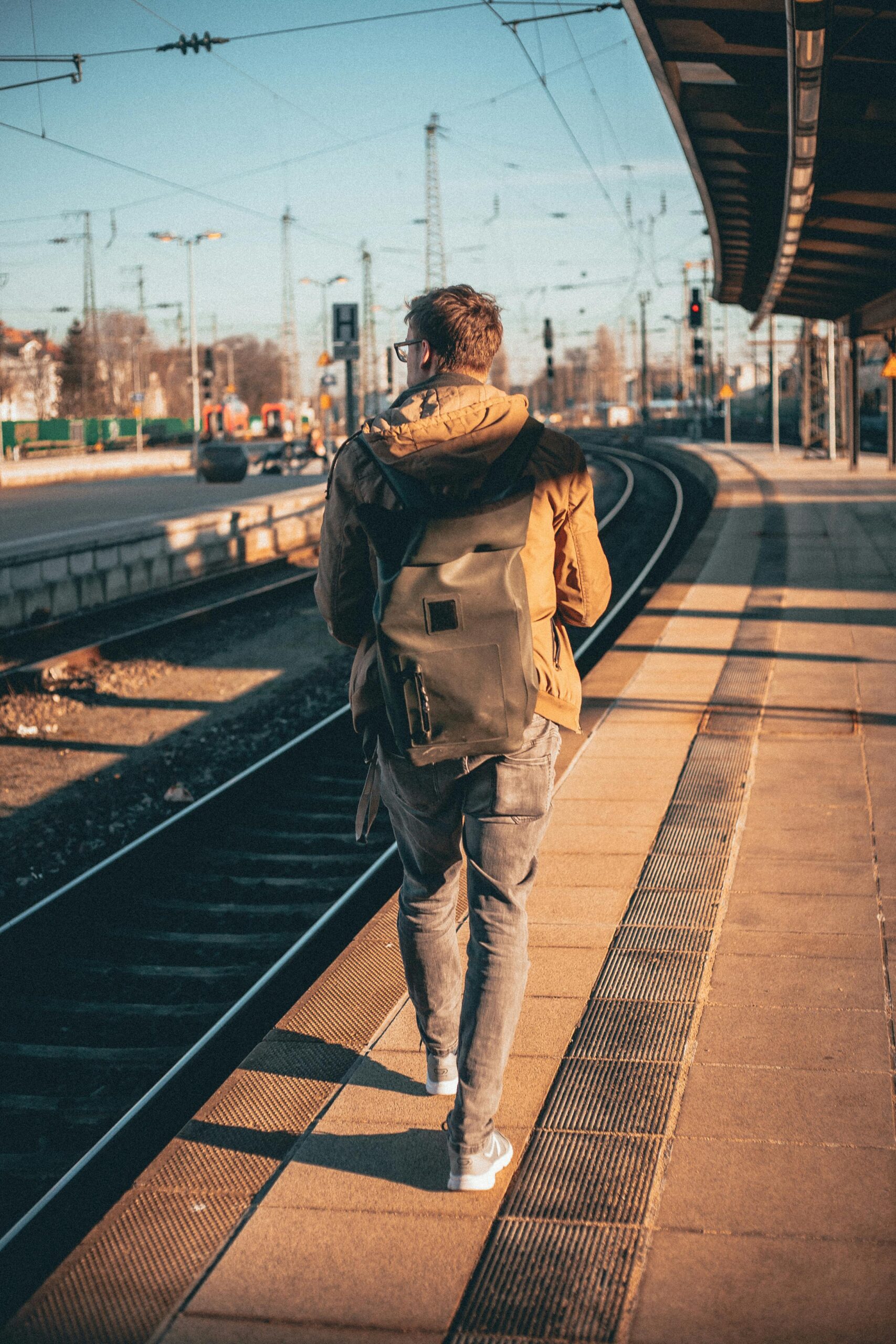 Backpacker looking over a stunning European landscape